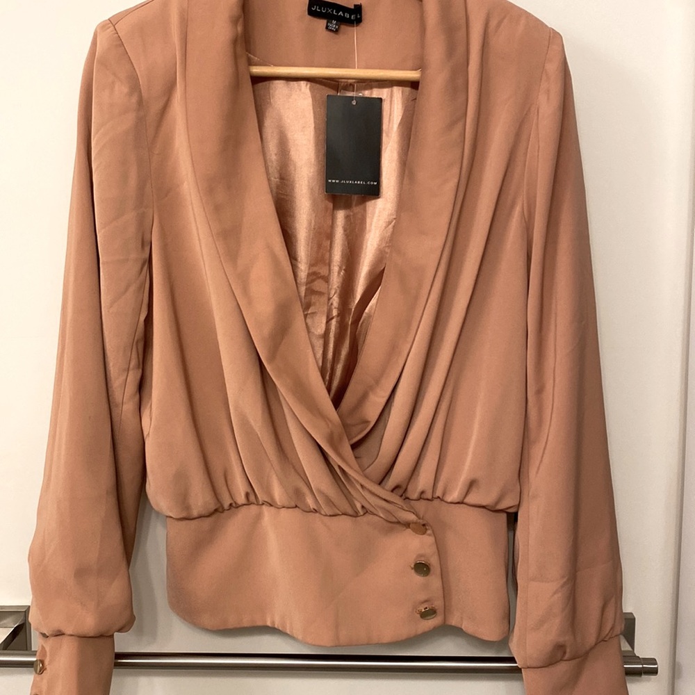 New with tags blouse and/or jacket size medium. It seems to run small .